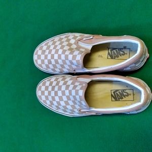 Women's checkerboard Vans.